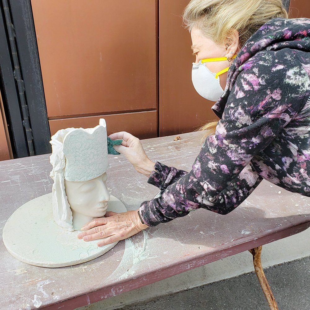 Kathy Abrams touching up her Head Case Vase outside the ceramics studio at PVAC.

#ceramics
#sculpture
#romanticism
#laart
#palosverdes
#losangeles
#art