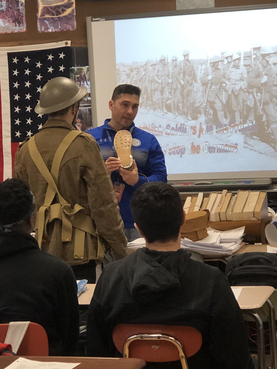 swb1321's tweet photo. Mr. Buccheri and Mrs. Brennan’s US History classes trying on reenactment uniforms from World War I. This particular uniform was from a British regiment. @StudiesChs #Carmel6c’s https://t.co/ntqg5tNpzN