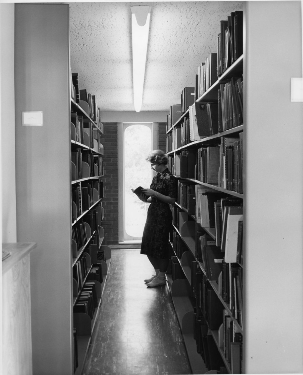 WashULibraries's tweet photo. From the archives: Students in the stacks of the libraries at #WashU. Photos courtesy of University Archives. https://t.co/NdUL6d6SsD