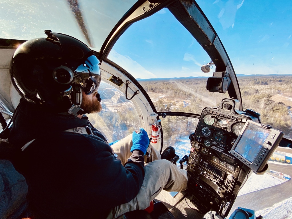 EversourceNH's tweet photo. We got an up-close look at our contract crews installing lightning arresters on transmission structures in Londonderry and Hudson this afternoon. 🚁 This upgrade will enhance reliability for 1000s in the region. Stay tuned… #behindthescenes @haverfieldhelo #PARElectric https://t.co/sJhzf6kVix
