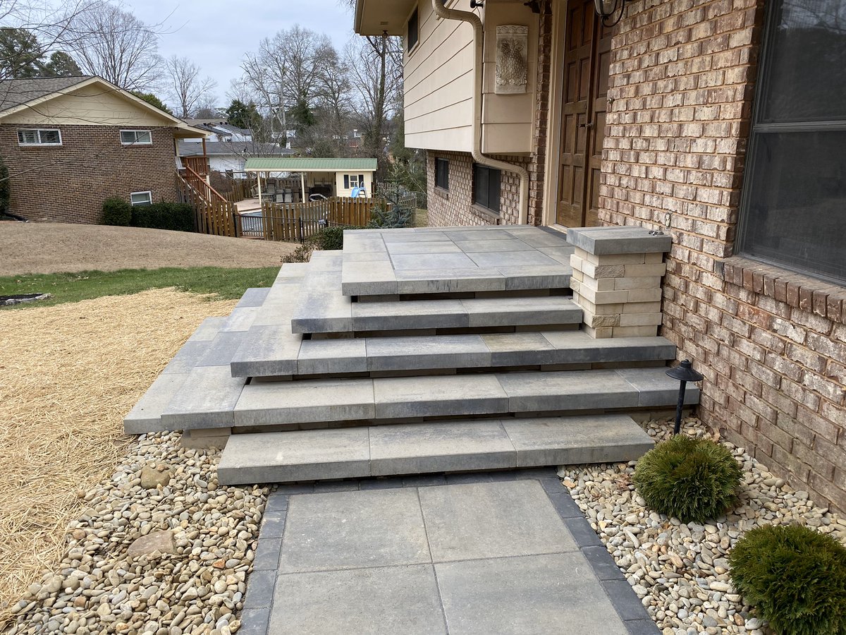 TechoNerren's tweet photo. Awesome work-in-progress shots by our very own #TechoPro @mccoshlandscaping! 
Phenomenal use of @techobloc Raffinato caps in step-treads, very creative use of our #Graphix wall/pillar used as a mailbox, and walkway using our Industria slabs, bordered by our #Victorien pavers! 👏🏻 https://t.co/b4pkR26Q9R