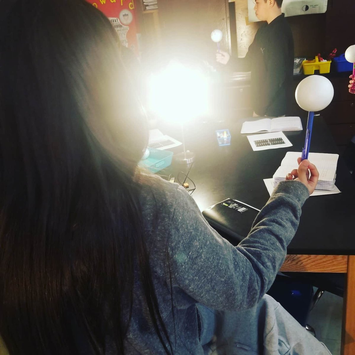 MrsWilliamsCh4's tweet photo. WAAG: Identifying moon phases and the sequence of the lunar cycle. Students engaged in various activities, including oreo moon phases #food! &amp; a lunar cycle simulation with a syrofoam/lamp/pencil #simple #lafoScience #leadwithLAN #teacher https://t.co/8vbXv2O06k