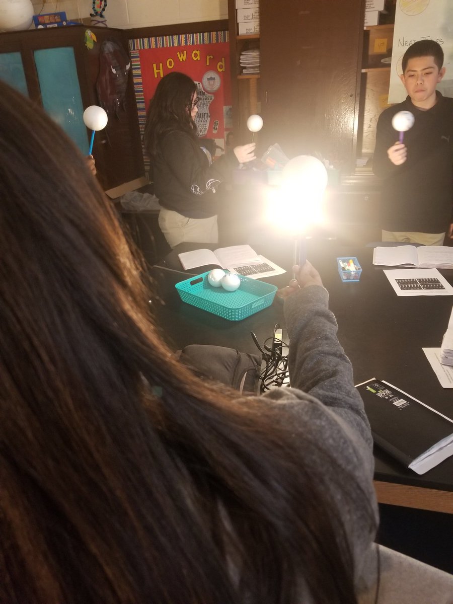 MrsWilliamsCh4's tweet photo. WAAG: Identifying moon phases and the sequence of the lunar cycle. Students engaged in various activities, including oreo moon phases #food! &amp; a lunar cycle simulation with a syrofoam/lamp/pencil #simple #lafoScience #leadwithLAN #teacher https://t.co/8vbXv2O06k