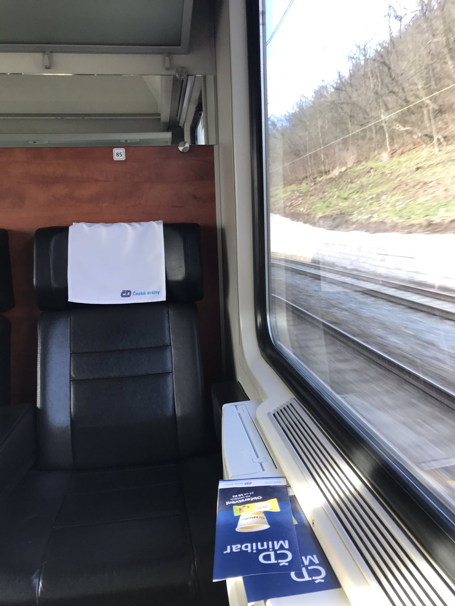 Slightly different train this time on ČD, this time with leather-style seats and four power plugs and four USB ports for every three seats. Got a compartment to myself again
