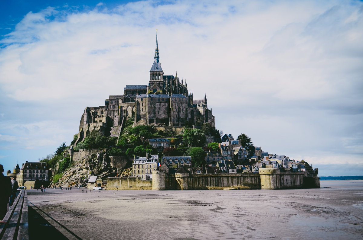 Mont-Saint-Michele - a place where the weather and light and tide and sea are constantly shifting, but the citadel stands strong for 1000 years 😊🏰🇫🇷 #castles #chateau #normandy #unescoworldheritage #castlesoffrance #medievalhistory #worldheritage @UNESCO @unesco553