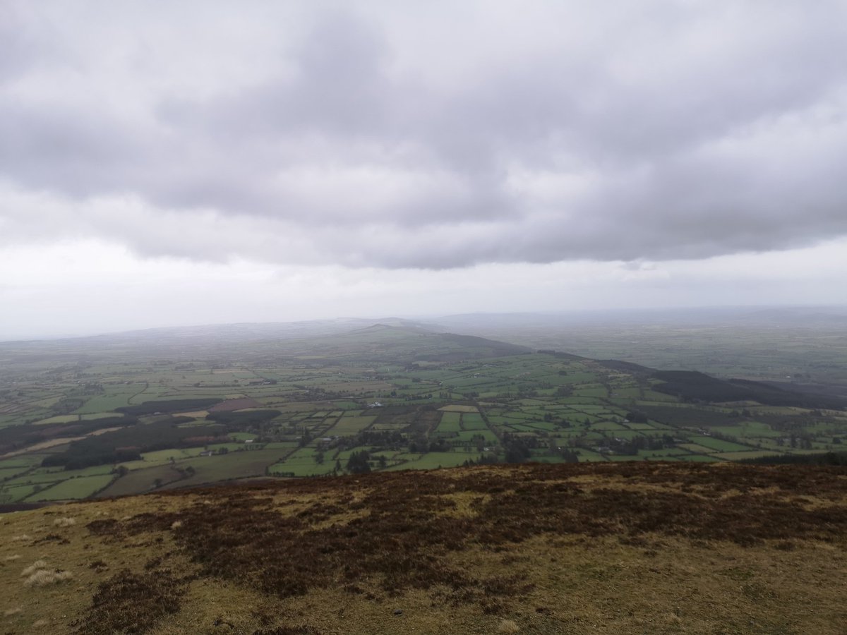 DelahuntyM's tweet photo. Enjoyable 50 min jaunt up my local favourite Slievenamon today. Wonderful views down over my own parish over 20km away #TheMon #Ballykeefe @kilkennyweathar @CarlowWeather @ScenicWalks @HiPointIreland @HillWalkingDay @walkhikeireland https://t.co/R8rE5Vl0Xs