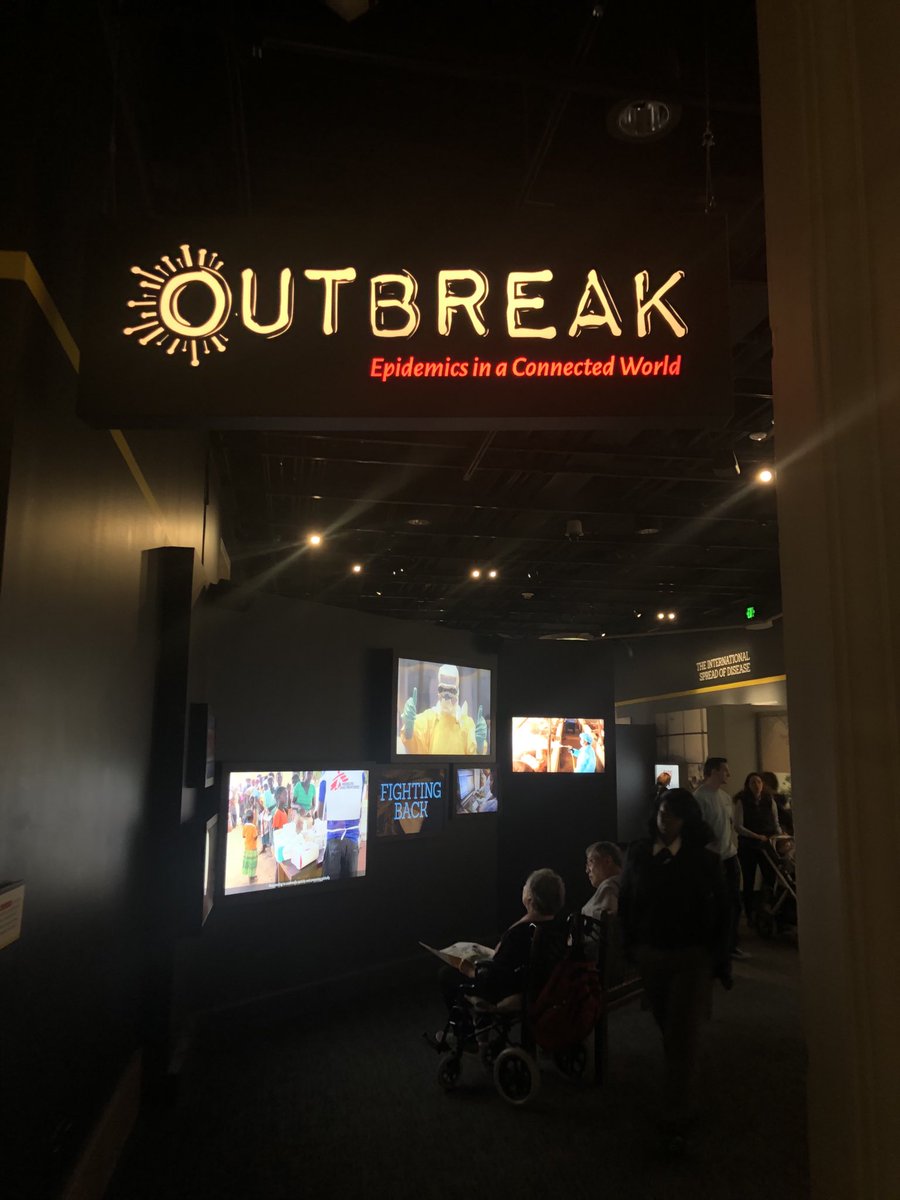 IlonaKickbusch's tweet photo. Fascinating to watch the people in this exhibition- doing simulations and especially parents explaining it to their children. One grandma shows little girl exhibit on Wuhan and says: that’s why your daddy works so hard! #Outbreak ⁦@smithsonian⁩ https://t.co/WZKokr8st1
