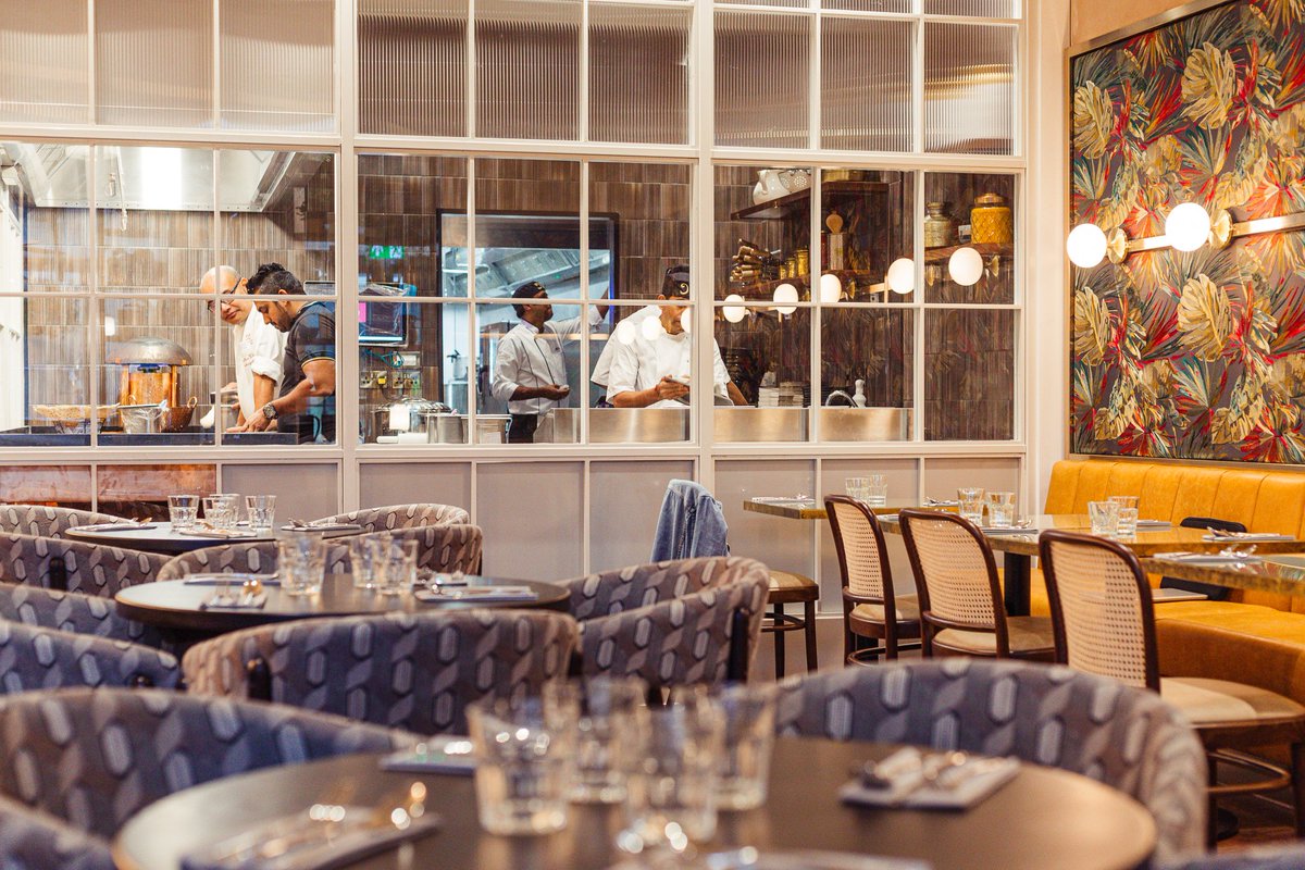 Unique views inside the kitchen await at #CopperChimneyUK… Watch our ‘ustads’ create delicious breads cooked over the tandoor flames 🔥