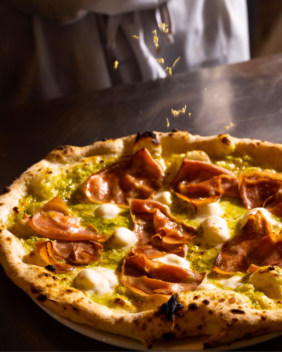 Is there anything better than crispy mortadella and lemon zest on a pizza? 💛