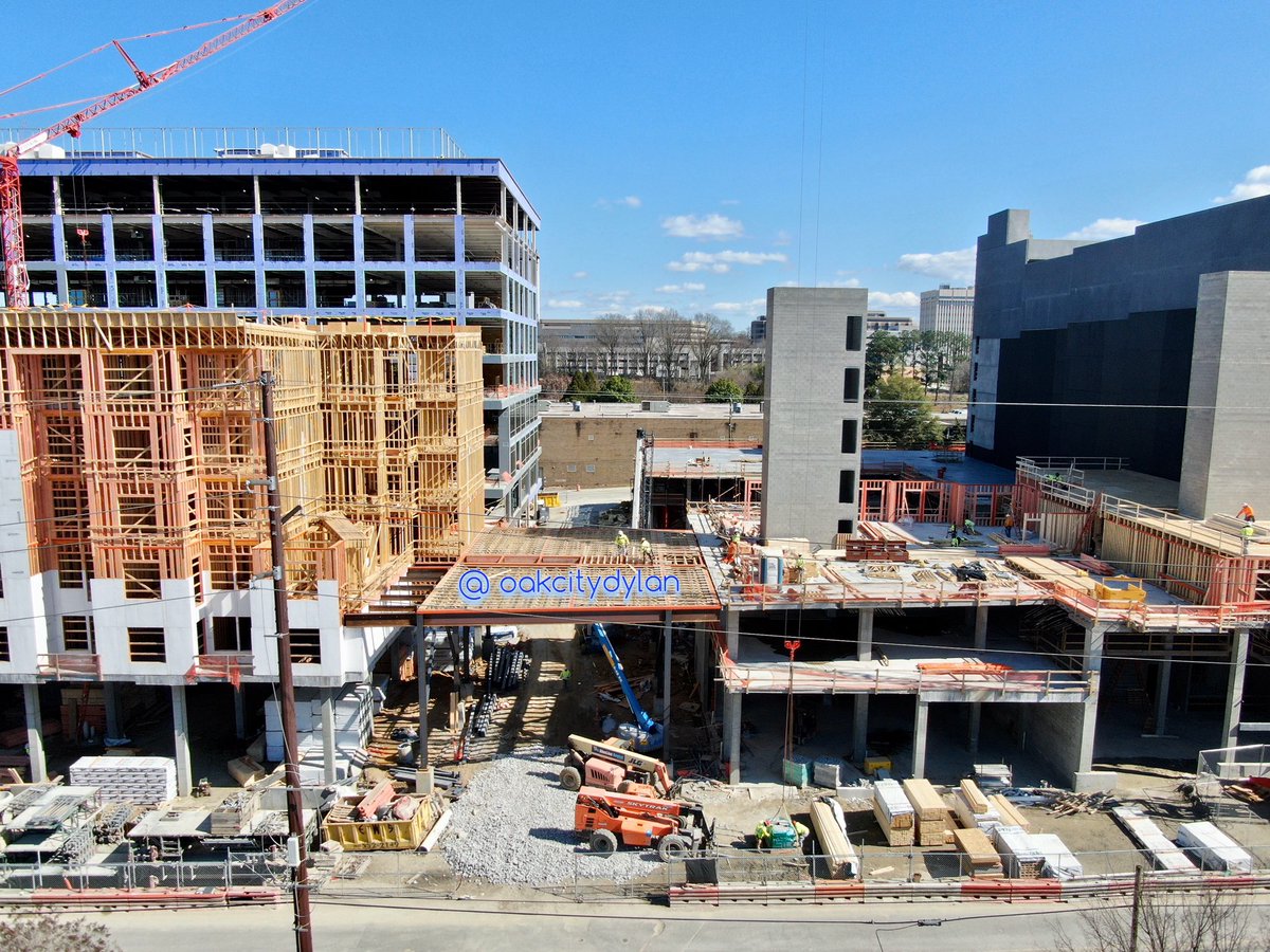 oakcitydylan's tweet photo. Posting some aerial shots I took today (2/29) of various DTR projects. Check out my feed or #dtraerial for more.
The hottest next DTR district, Smoky Hollow is coming together! I love the suspended apts over the Tucker ext. “The Hollow” will be amzng as well!
#rlghlife #dtrlove https://t.co/uwvGunKD3b