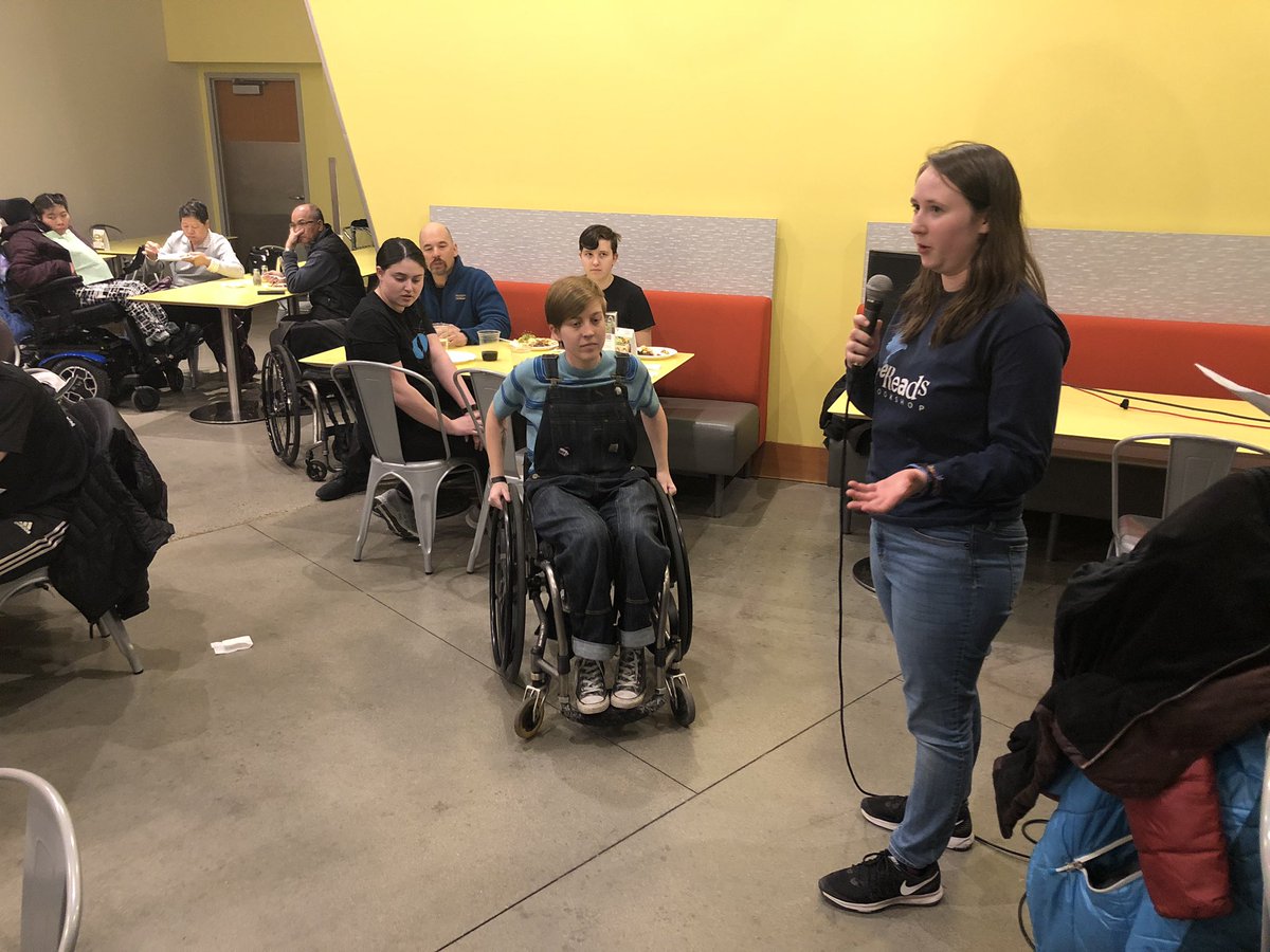 ATHackMIT's tweet photo. Team Erik shows us the wheelchair attachment they designed with a suspended tipping system. https://t.co/ccCxu0jL2x