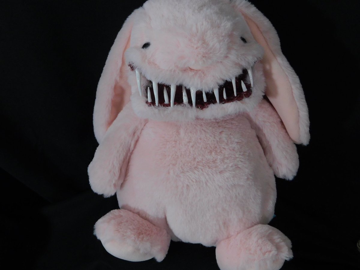 grueoddities's tweet photo. Meet Pinky Psycho!
Peachy pink bunny with a grin 😁 
Sitting at 11” 
This little cutie is looking for a home! 

#horror #horrorart #HorrorCommunity #plush #stuffedanimals #horrorbear #horrorplush #evilbunny #oddities #handmadehorror #horrordoll https://t.co/zoxNo2OdPv