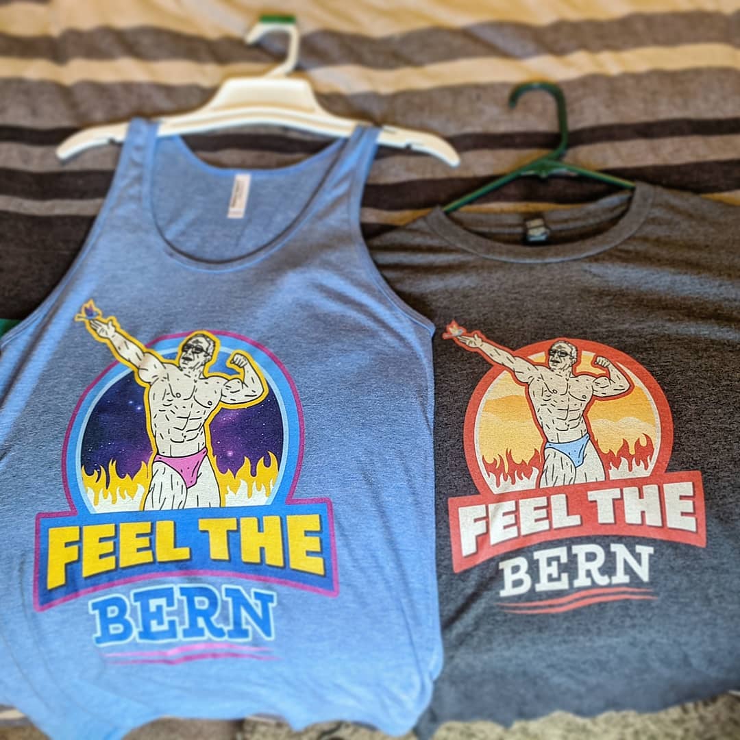 Heather_FW3's tweet photo. When your husband is a graphic designer and you #FeelTheBern 🔥
#Bernie2020 #BernieSanders #NewFavoriteShirt
#BuffBernie artwork: @nicoledaddona
T-shirt design: @WheatonCreative
Gunshow brought to you by #Plants
#WholeFoodPlantBased 💪🏼😁🌱 https://t.co/FGmDDxlEaX
