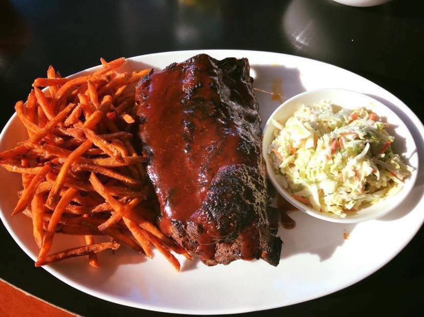 A half rack of our tantalizing #Barbeque Baby Back #Ribs for lunch or dinner? Yes, please! They're served with #sweetpotatofries, cole slaw and the best view of @FunLakeMO! Enjoy and check out our complete dinner menu at the all new baxterslakesidegrille.com