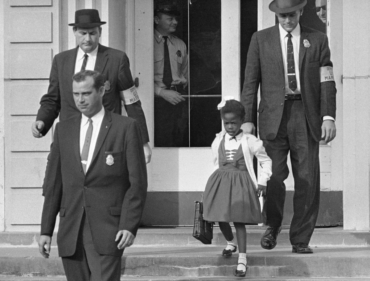 majascheler's tweet photo. In honor of #BlackHistoryMonth this poem was inspired by a 1960’s photo of #RubyBridges. Not mentioned was her mother’s bravery or the compassion of the only teacher who chose to stay and teach Ruby for an entire year, Mrs. Henry.
 #amwriting #poetry #writingcommunity https://t.co/YhPIFxnaHr