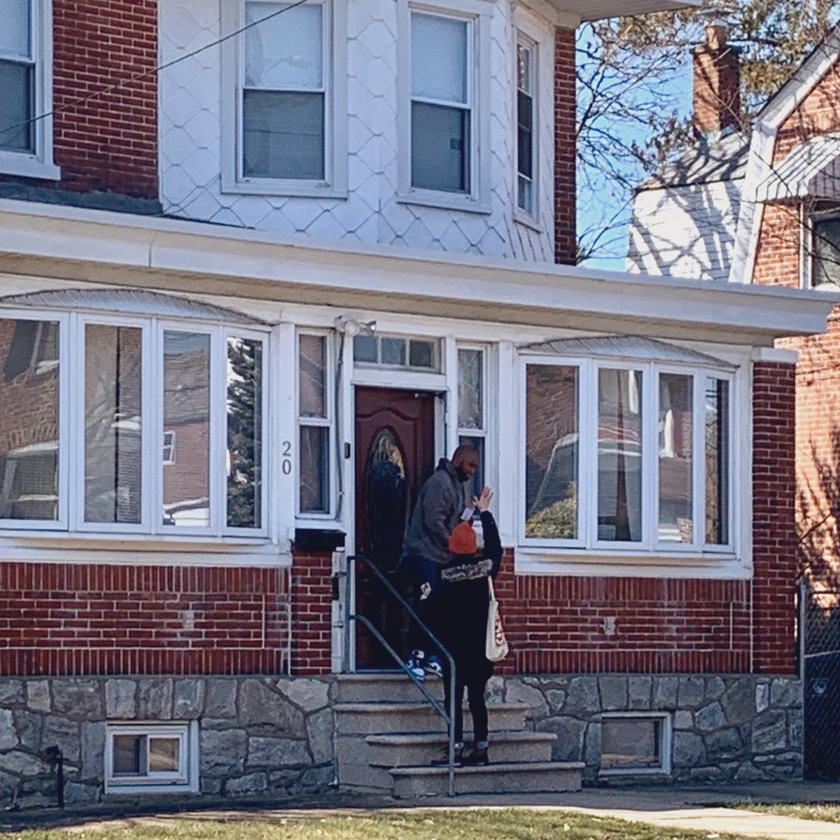 Jess highfiving a voter at their door