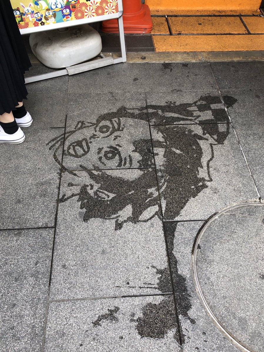 道頓堀の道んとこにすごいのあった。たんじろ〜! 