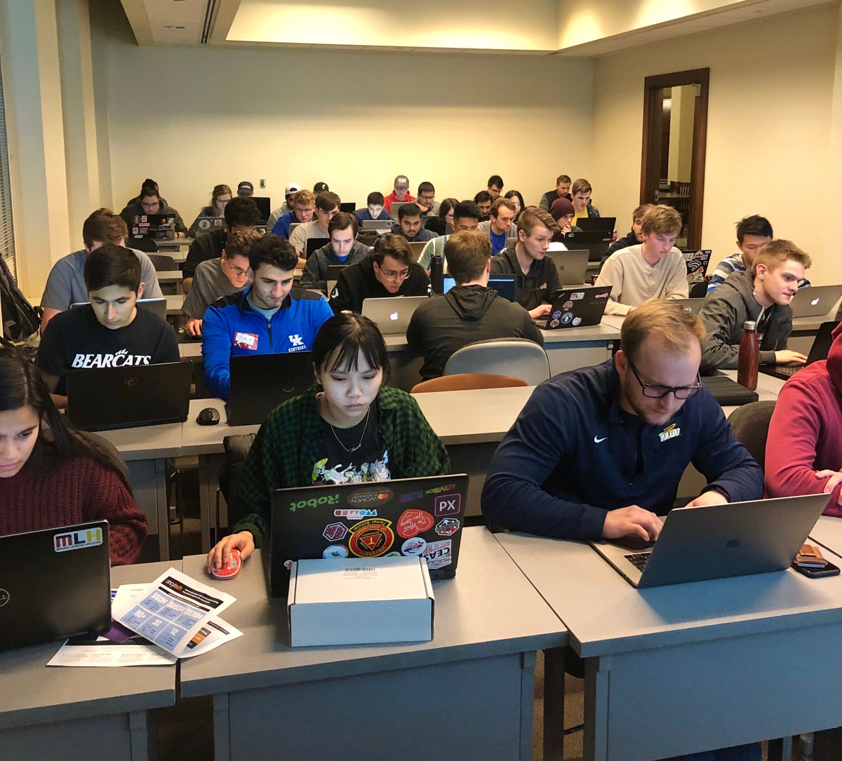 MLHacks's tweet photo. Hackers @Revolution_UC hard at work on the @USAFRecruiting Cyber Security Challenge 😤👊 #RevUC https://t.co/Yk9blU765s