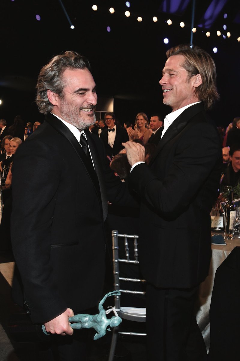 VeganEarthling's tweet photo. Wonder what the comment between #SAG winner #JoaquinPhoenix and #BradPitt was. https://t.co/ZGa0tuiFJJ