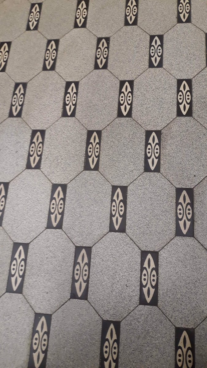 gerthuskens's tweet photo. Floor tiles at the Leuven Sint-Rafaël  hospital displaying shields in an ‘African style’ commemorating the contribution of Katangese radium to medical radiography. 🇨🇩☢️🏨#colonialmemory #congoinbelgium https://t.co/4fuMokXbBB