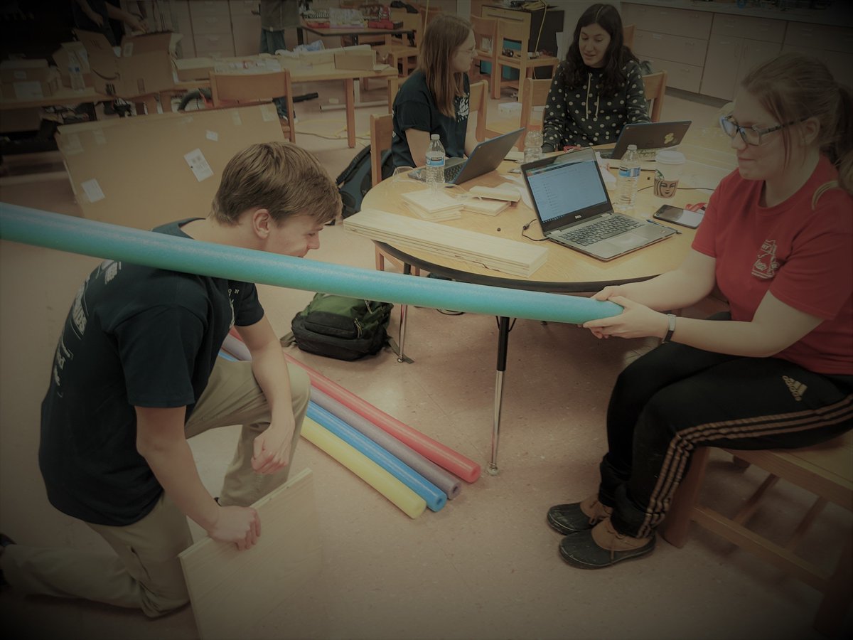 Hudson Hybrids team captain being knighted by a lead advisor (2020, colourized)