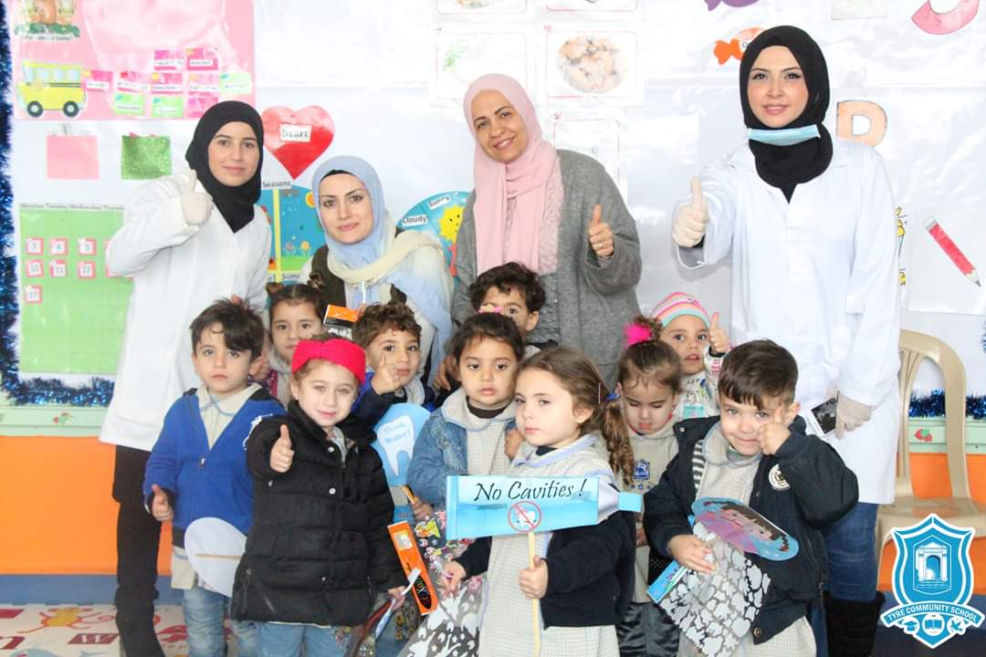 TyreSchool's tweet photo. Celebrating Children's  Dental Health Month, KG1 and KG2 students had 2 lovely visitors; Dr. Esraa Moussa and Dr. Hanan Dbouk who visited the kindergarten department,  talked to kids about Dental Care and checked all kids teeth.#tcseverythink 
#TCS #edulebanon https://t.co/tSIQIYFVCz