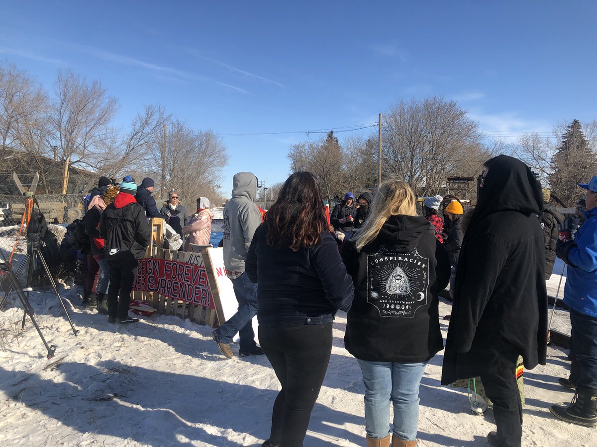 Day two of our peaceful action beside the train tracks in inner-city Saskatoon 🥰 #NoTrespass #WetsuwetenStrong #KillColonialismSaveTheNDNs