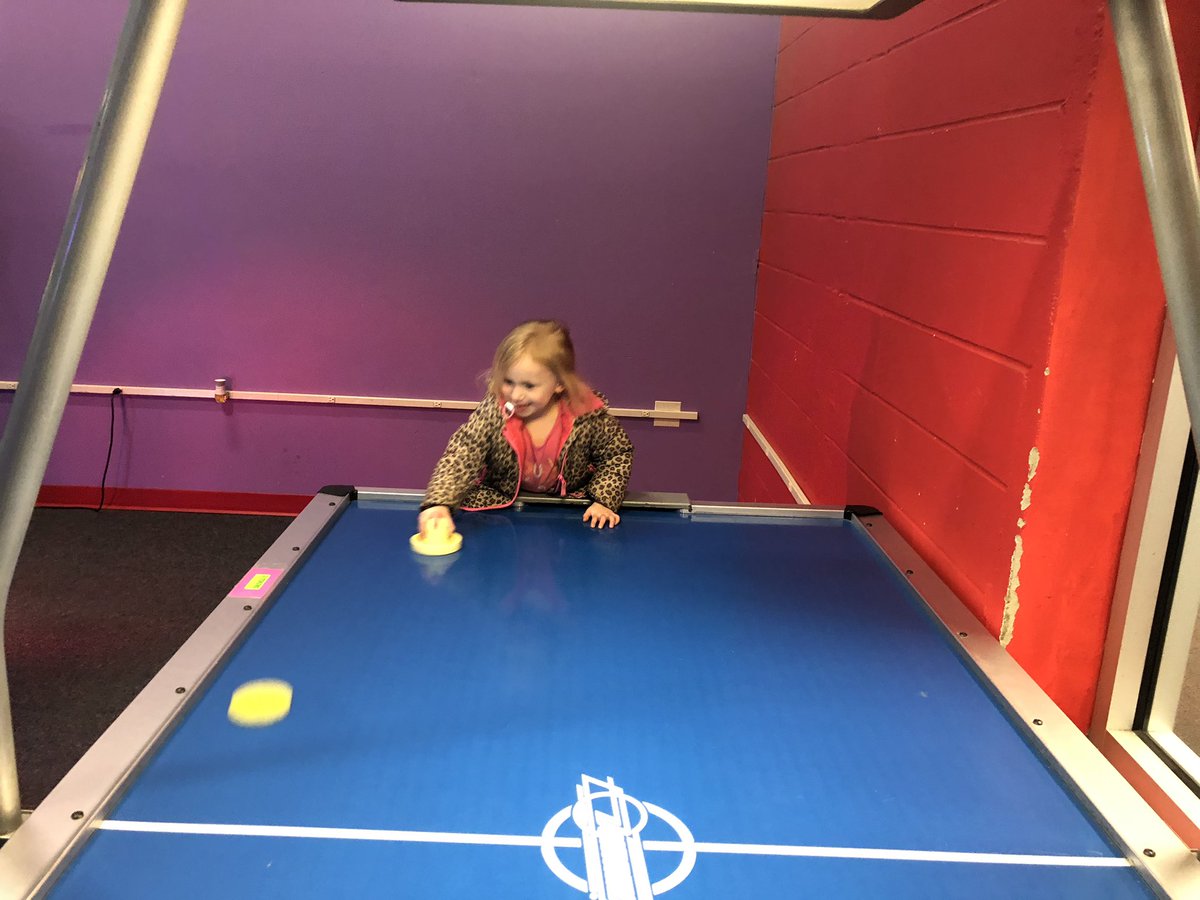 rpmlive's tweet photo. She is an air hockey powerhouse. Don’t let the pacifier deceive you. #ArcadeDay https://t.co/mddcXjdyLT