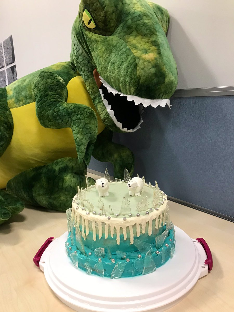 EmmaOwnsworth's tweet photo. My attempt at a Greenland Ice Sheet inspired cake for the @DurUniEarthSci bake off today! ❄️🍰❄️ 
Best get it eaten before something else does... 🦖👀 https://t.co/gesEK58W8r