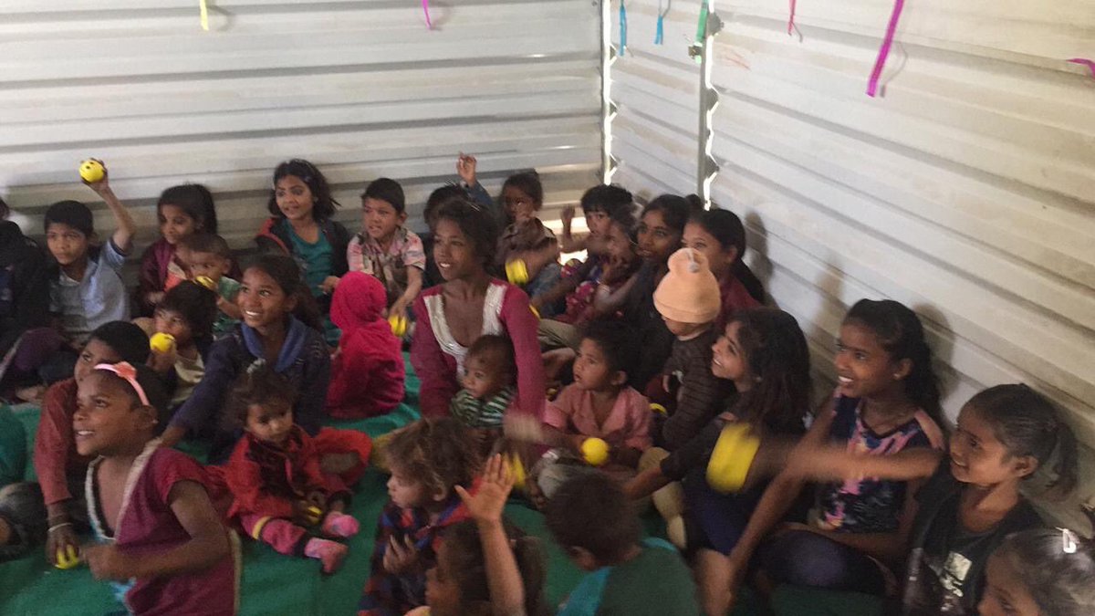 EdelGive's tweet photo. In #India, more than the cold weather, it is the lack of warm clothes that kill people. To make this winter season bearable, 15 @Edelweissonline employees distributed brand new clothes, food and mats to the 40 children who were in need of it.#EdelEngage @RobinHoodArmy #volunteer https://t.co/mGLCzHOTk8