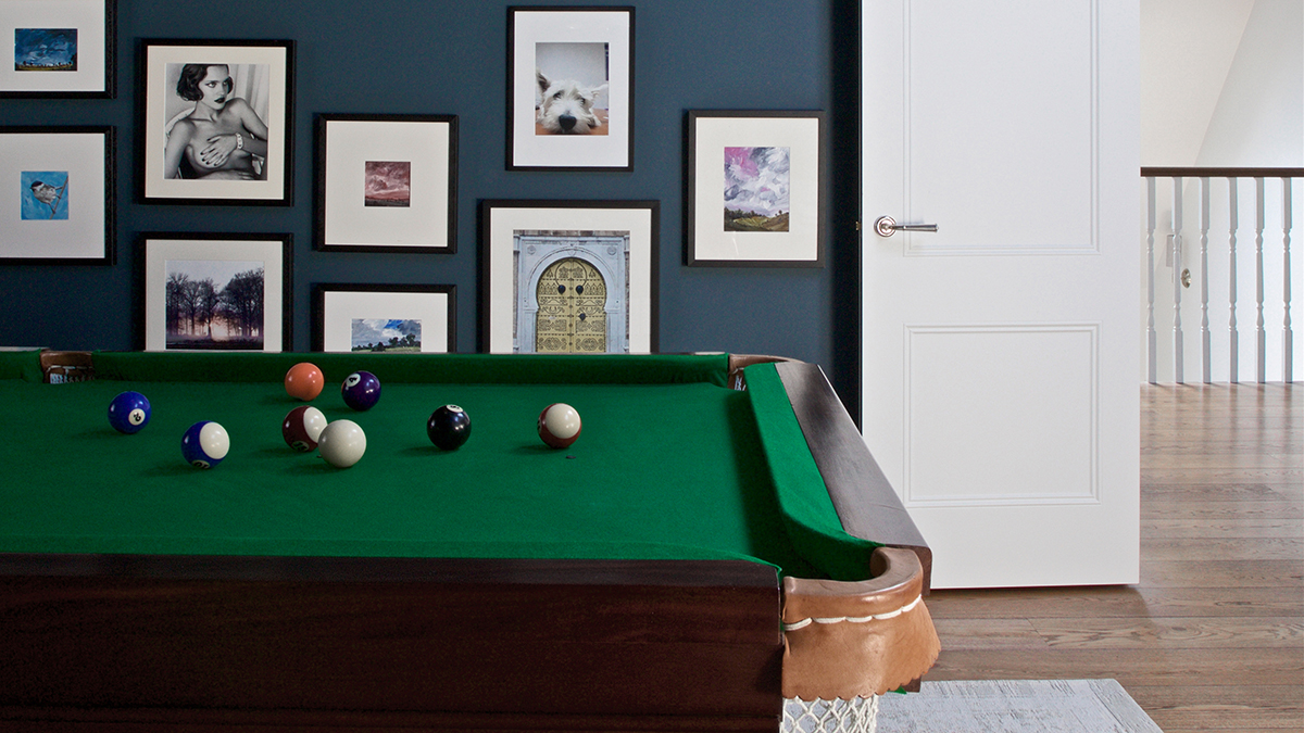 GAMES ROOM | We always have a lot of fun creating these personal spaces for our clients. 
On the walls, we opted for a bolder dark teal to enhance the dramatic feel. 
#MarloeInteriors #interiordesign #homedecor #instalove #gamesroom #snooker #funroom #snookertable #picturewall 🎱