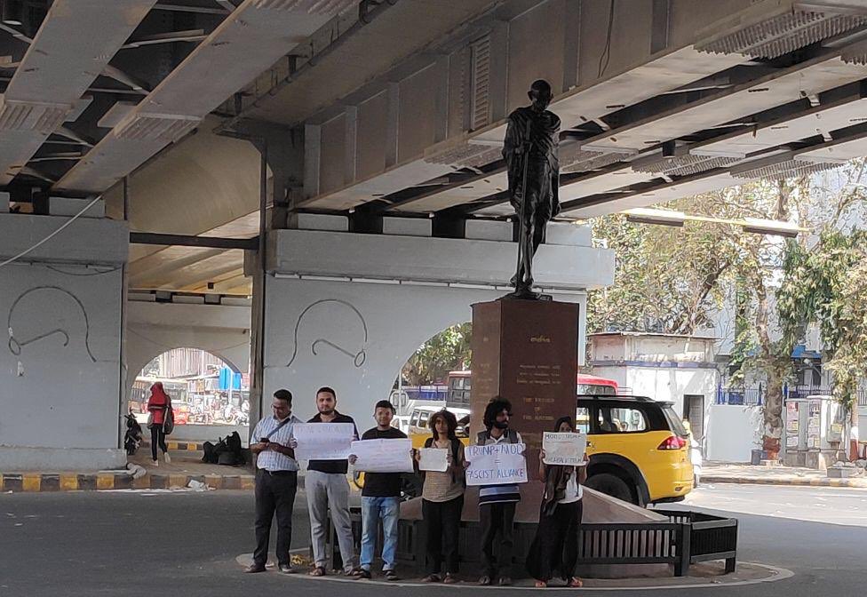 GujAgainstCAA's tweet photo. Despite the early arrest of human rights activists of the city, a few students of Ahmedabad gathered at 5 different popular landmarks of the city during @realDonaldTrump visit and registered their dissent over alliance of two fascist regimes!  
#NamasteyTrump #TrumpGoBack https://t.co/WvjJzJinrK