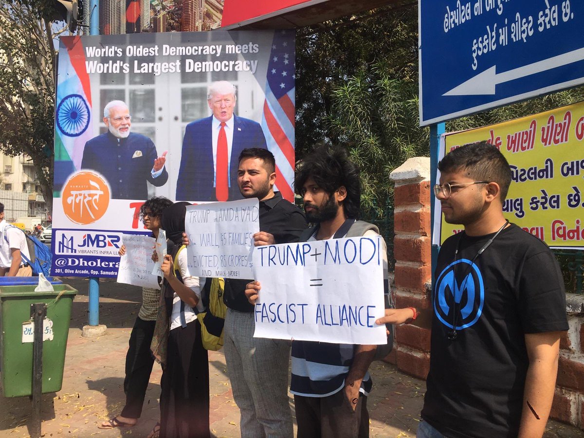 GujAgainstCAA's tweet photo. Despite the early arrest of human rights activists of the city, a few students of Ahmedabad gathered at 5 different popular landmarks of the city during @realDonaldTrump visit and registered their dissent over alliance of two fascist regimes!  
#NamasteyTrump #TrumpGoBack https://t.co/WvjJzJinrK