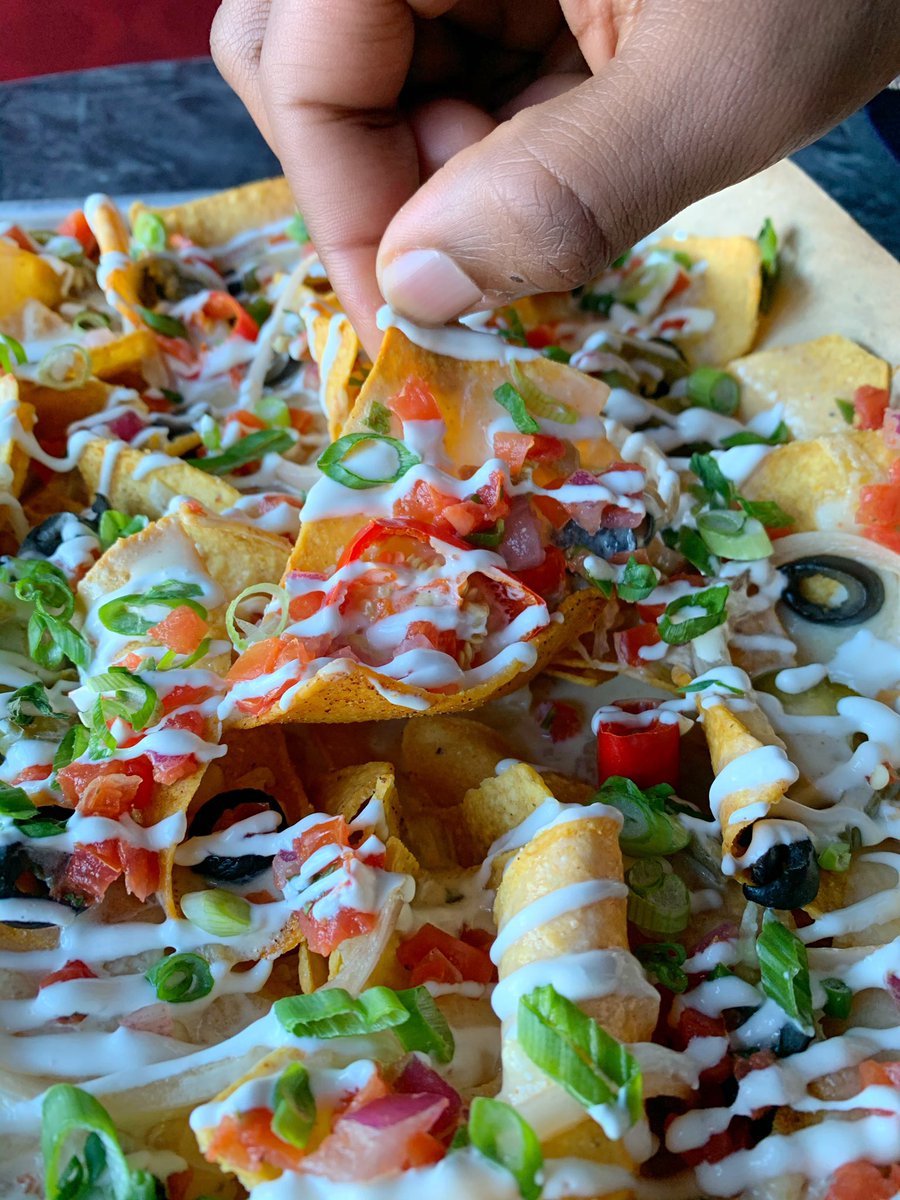 Celebrate #NationalTortillaChipDay the right way + order up a platter of our famous nachos