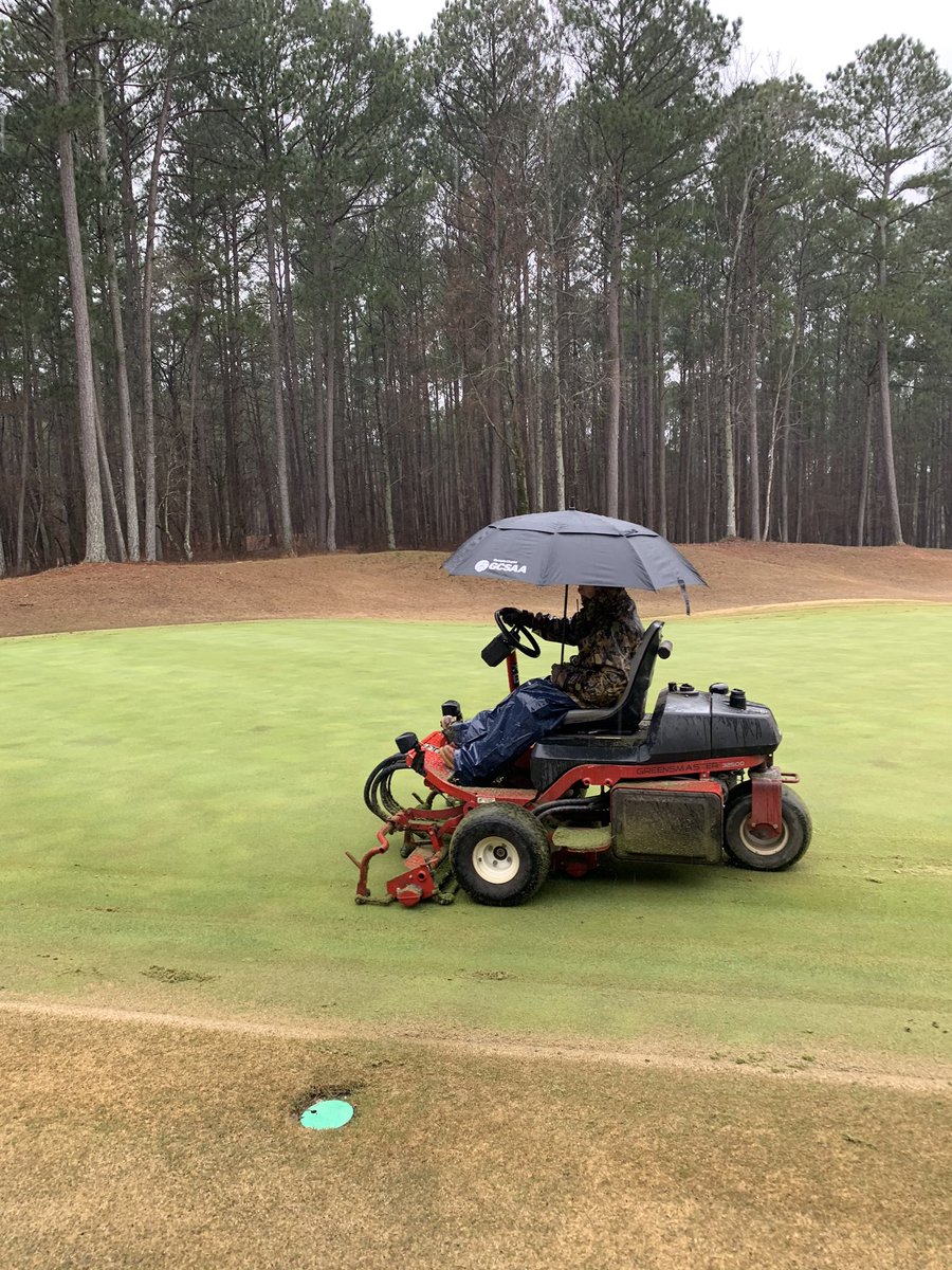 Holy_Powell11's tweet photo. Making the best of this dreary Monday. Little verticut and solid time action at The HC. Guys did a great job in knocking out as much as we could during this weather today. Had to use the umbrella for a little entertainment. #HarborClub https://t.co/aJHEVzbOBP