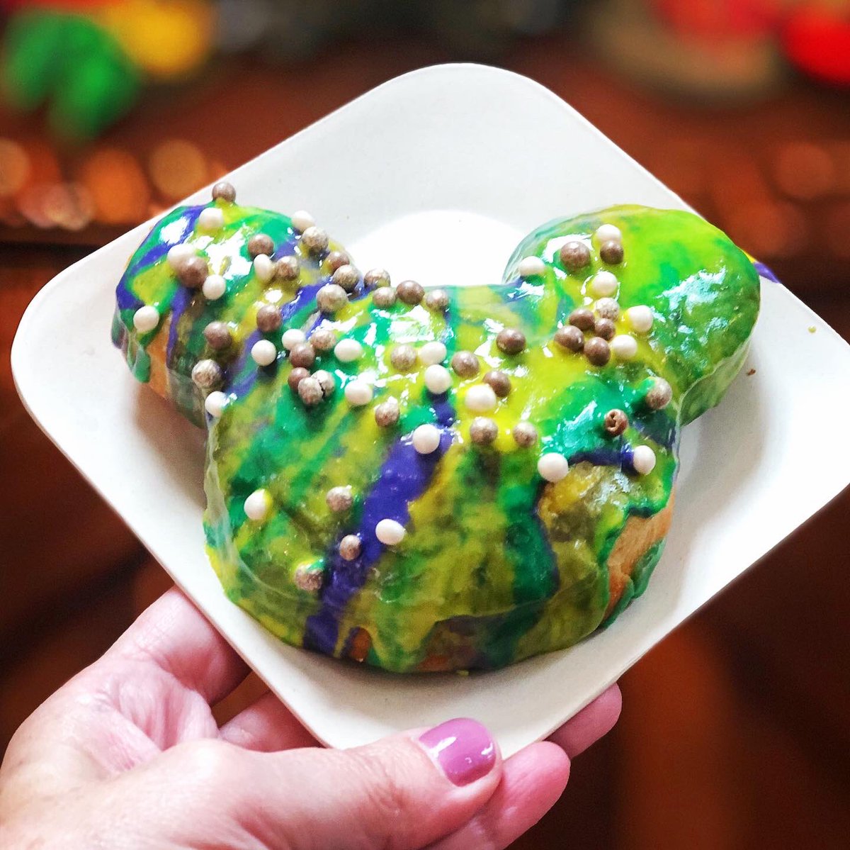 ItsJenDixon's tweet photo. Mardi Gras beignet from @WaltDisneyWorld’s Port Orleans French Quarter! 💜💚💛 https://t.co/FxXahn3dD9