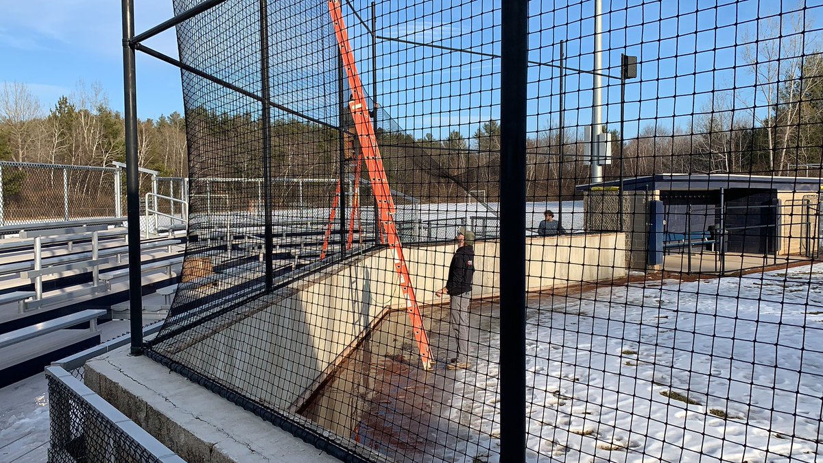 Getting new backstop netting up for <a href="/SNHU_Softball/">SNHU Softball</a> - new pad wraps completed over winter, ready to get tossed up- great job by the crew today #RollPenmen