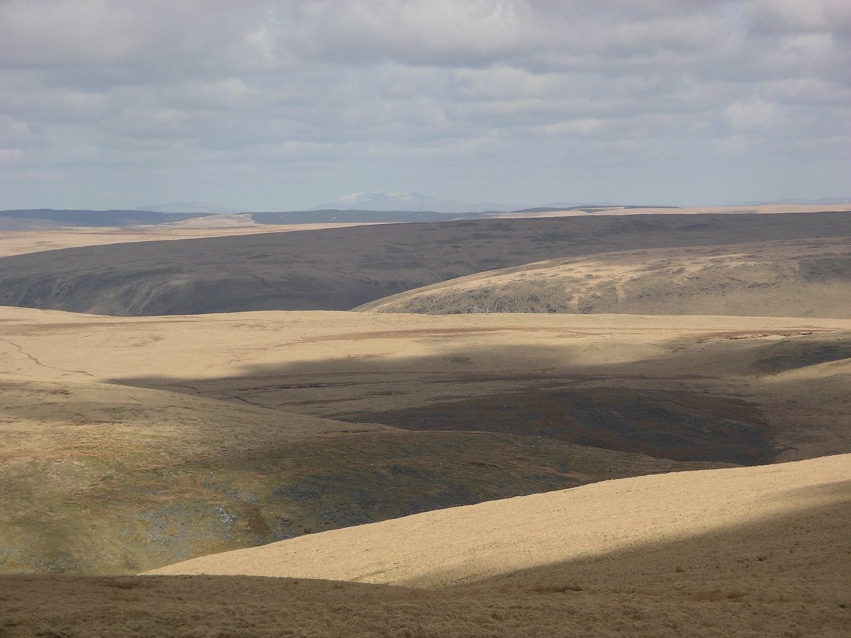 On the left, a desperately degraded former savannah in northernmost Africa. Virtually no trees or wildlife remain after decades of overgrazing by sheep and goats. On the right, the Cambrian plateau in Wales. The only difference between the two is the weather.