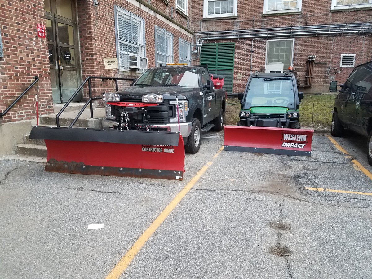 BarryGrodenchik's tweet photo. I was at #Queens Borough Hall earlier and saw these 2 #NYC vehicles parked. Can anyone tell me what the curved red things on the front of the vehicles are? #SnowlessWinter https://t.co/sB2P9C8zaf
