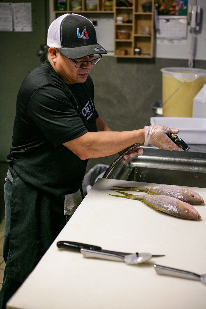 ConcernedCook's tweet image. Fresh seafood preparation at one of Miami's local gems, @LaCamaronera. #BehindtheScenes