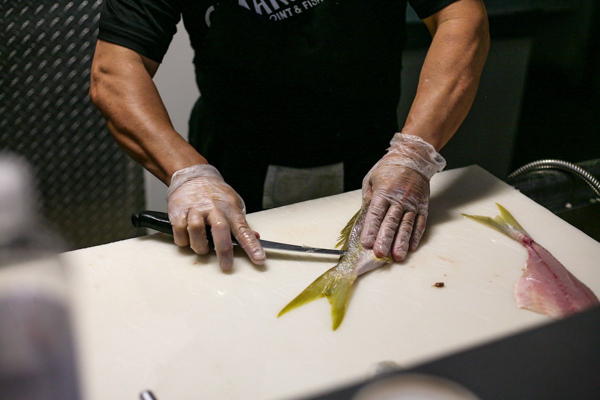 ConcernedCook's tweet image. Fresh seafood preparation at one of Miami's local gems, @LaCamaronera. #BehindtheScenes