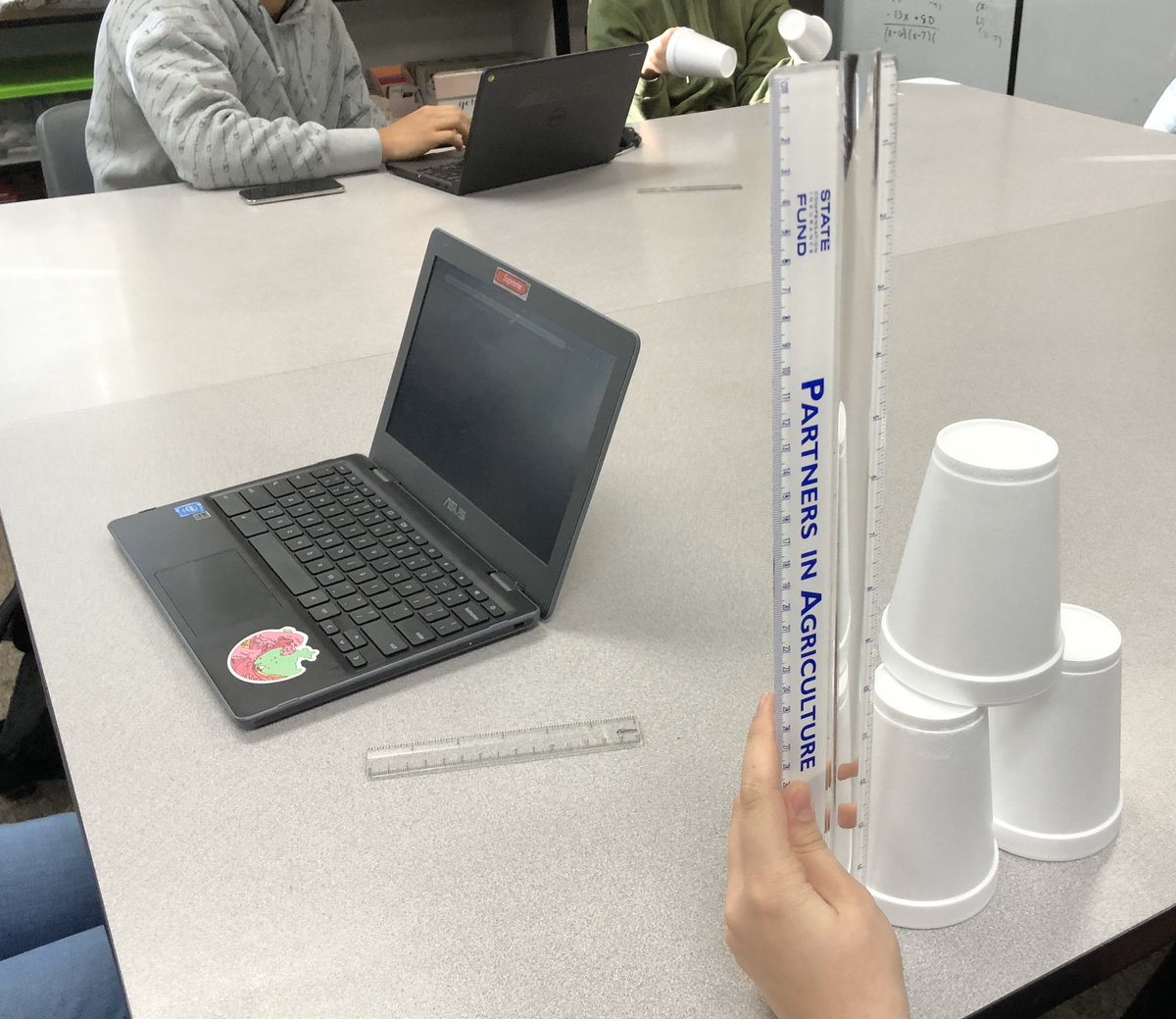 Amu_Kaur94's tweet photo. Students testing out their theory 🤔Question: How many styrofoam cups would you have to stack(free standing) to reach the top of Ms.Kaur’s head? 
Materials given: 3 cups &amp; a ruler information given: my height #MondayFunday #inspirationalmath #bchsinstruction https://t.co/dKsFZ8qW3D