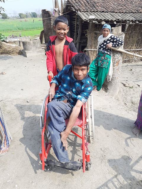 CILKathmandu's tweet photo. Kiran Tharu-17 is living with CP and is from the very remote area of Bardiya District is now able to move for school on a wheelchair with a little support. CIL-Kathmandu is happy to see  a big adorable happy smile on his face after receiving the wheelchair for his easy mobility https://t.co/SqenFwctmX