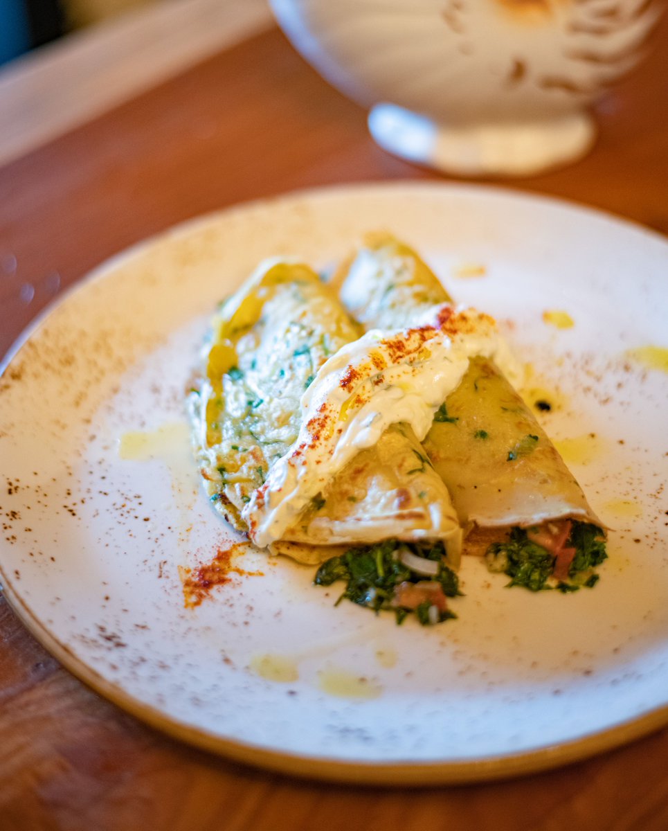 This is not just a pancake, this is a tabbouleh in the middle, gluten free pancake made with Chickpea flour and served with a dollop of minted raita for good measure.

 This is not just food, this is Trader Vic’s food.