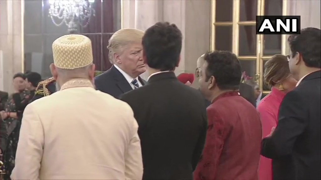 timesofindia's tweet photo. Delhi: Music composer AR Rahman &amp; chef Vikas Khanna present at the dinner banquet hosted by the President for the US Prez Donald Trump &amp; First Lady Melania Trump.

#NamasteTrump 
#TrumpVisitWithTimes
#IndiaWelcomesTrump 
#TrumpInIndia

(Pics: ANI) https://t.co/AeTgEmvNMM