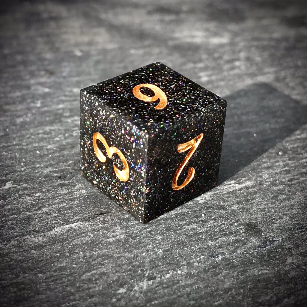 ThornlessRoseUK's tweet image. Glittering Black Smoke starts to appear, weaving its way between the wielders fingers. Power building the the spell is released upward, the faerie fire sparks raining down in a beautiful rainbow cascade.

Black holographic glitter #handmadedice set with odd #D20
#ttrpg #dnd #dice