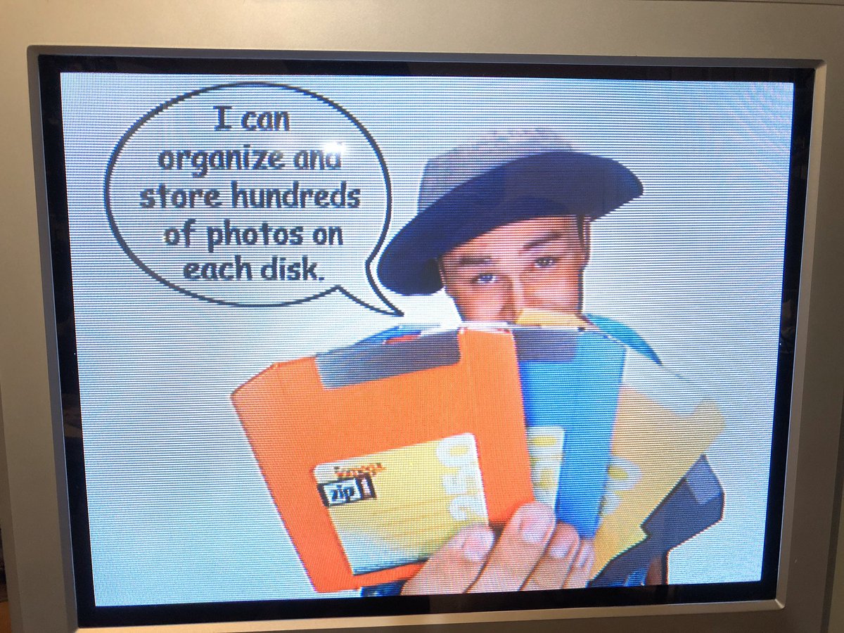 benjedwards's tweet photo. Because I’m a nut, I bought an Iomega FotoWorks (2000) new in box last year. It’s a 250MB Zip drive with composite video out. It came with a wacky pre-made slideshow on a disk

Was hoping I could play slideshows off of its CF slot, but nope-must copy to Zip disk first! https://t.co/kDK5P2m4FH