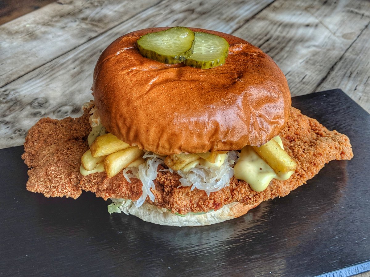 Ze German- pork schnitzel, sauerkraut, American mustard, mayo, skin on fries, pickles, shredded iceberg. #Foodporn #Cardiff