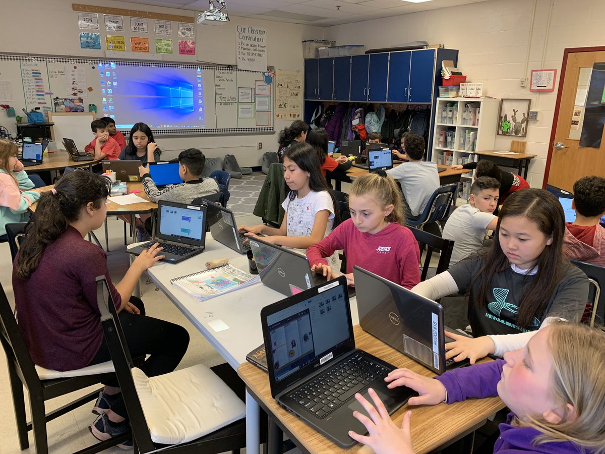 tscesney's tweet image. .@MrsLJOh class curates evidence for their #POGPOL portfolio. 

Use the shortcut Windows Button + Left Arrow to split your screen. Drag a photo from camera roll directly to your Google Drive folder.