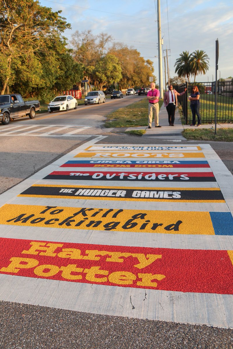 TransformHCPS's tweet photo. Mayor @JaneCastor unveiled her second #CrosswalkstoClassrooms artistically painted crosswalk this morning at @HCPSWoodsonPK8. Special thanks to the City of Tampa's Transportation Dept., Jacobs Engineering Group Inc. and artist @Jaygiroux! https://t.co/CNLpo9Bkj5